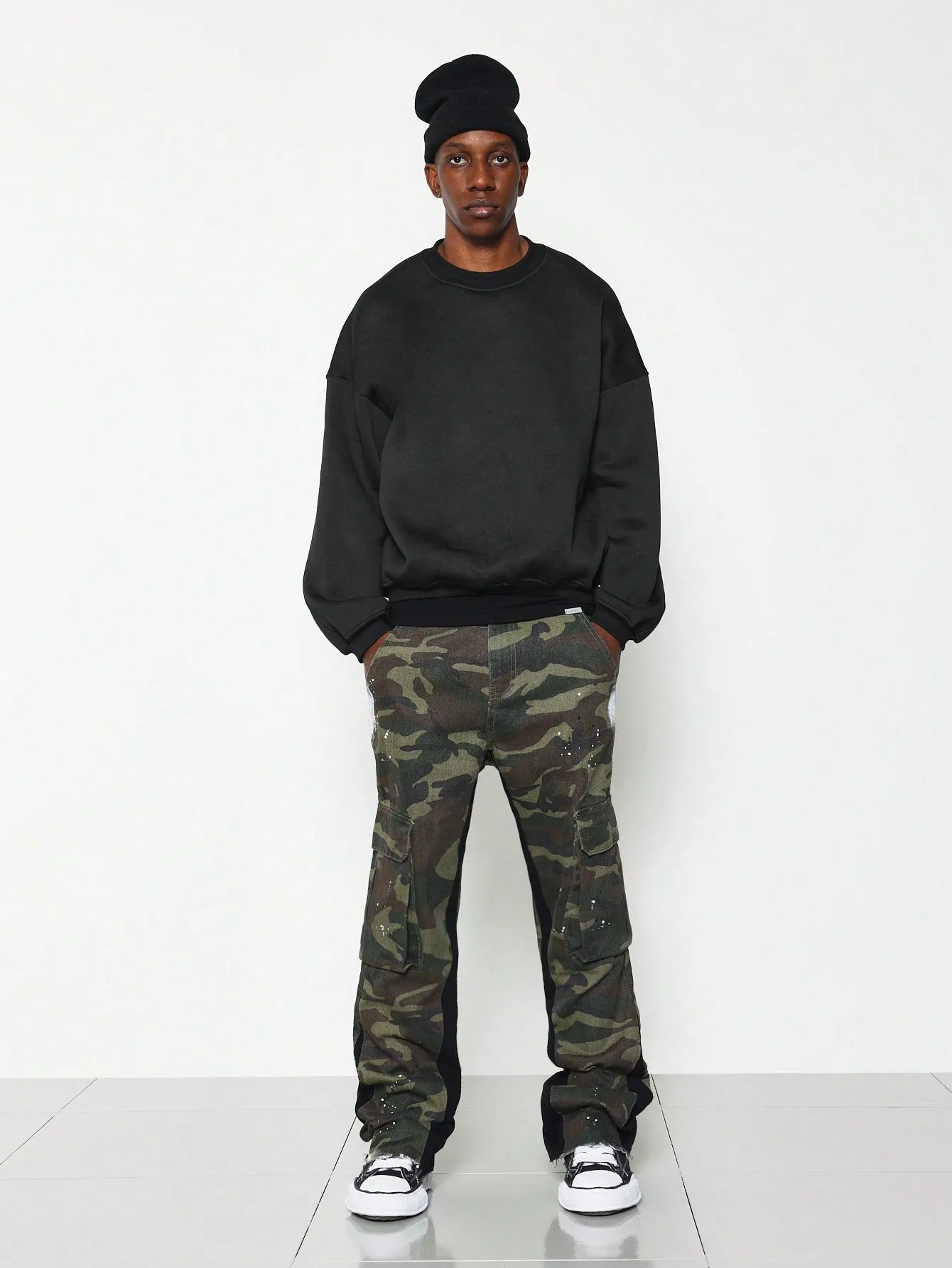 Flare Fit Camouflage Raw Edge Jean With Contrast Colour Panels & Splatter Paint